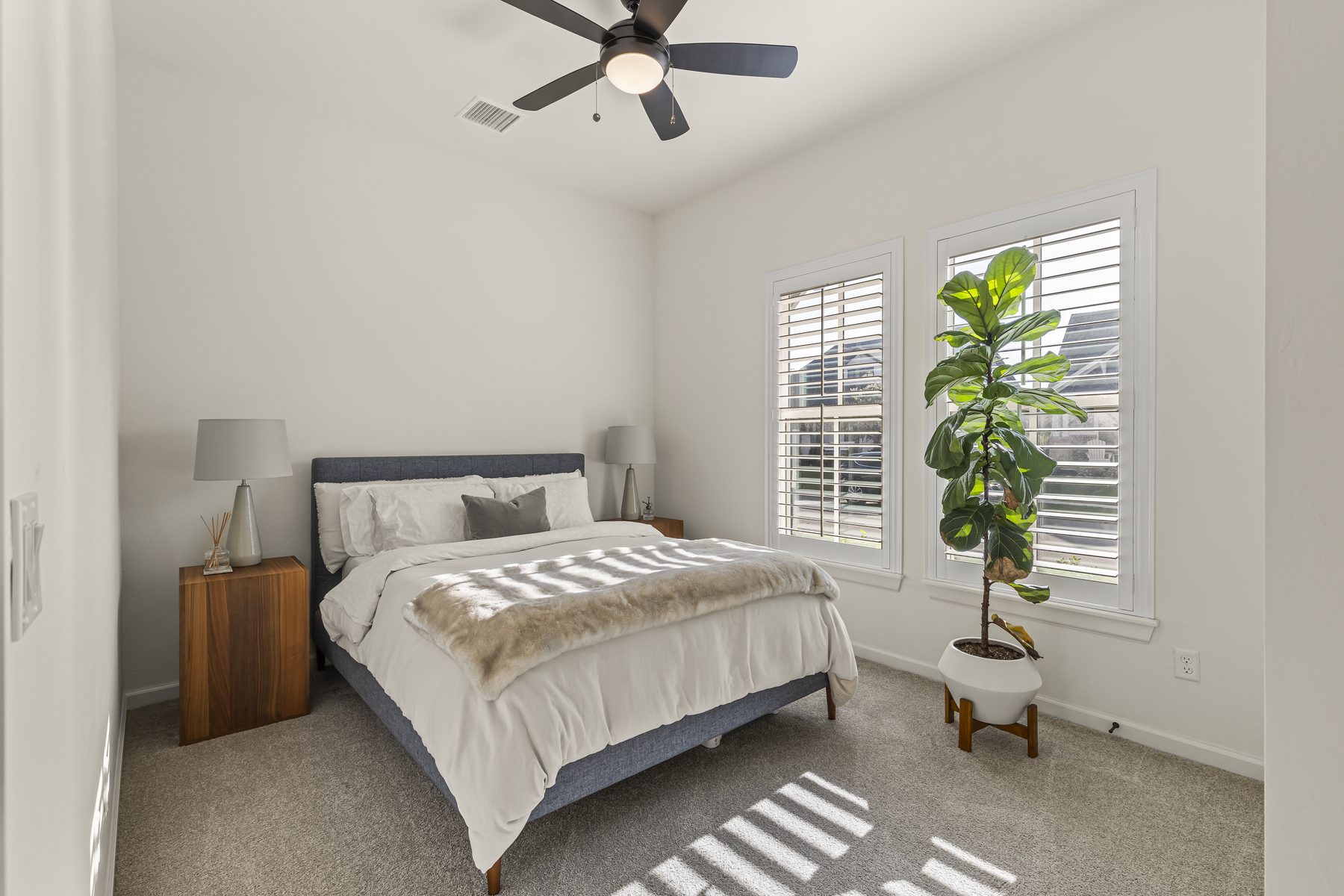 Bright, clean staged bedroom