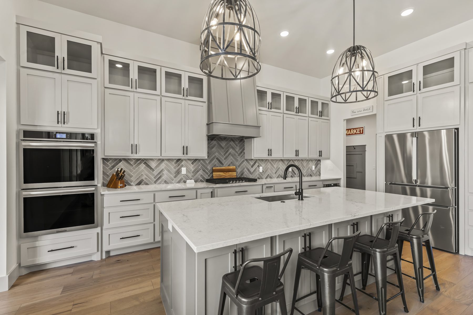 Modern kitchen with island and pendant lighting