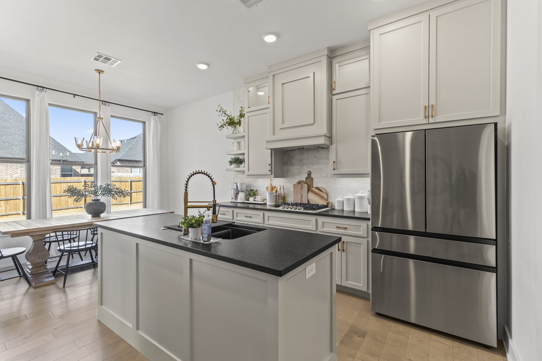 Bright, professionally lit modern white kitchen