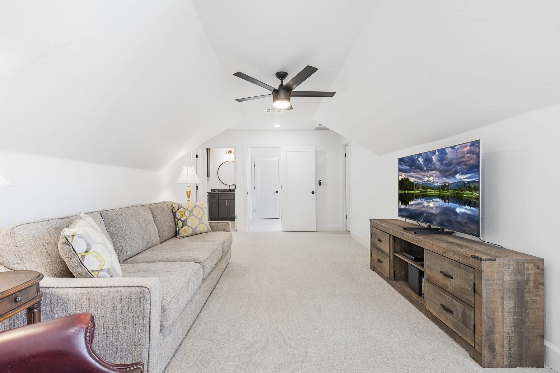 Living room with sectional sofa, bright light